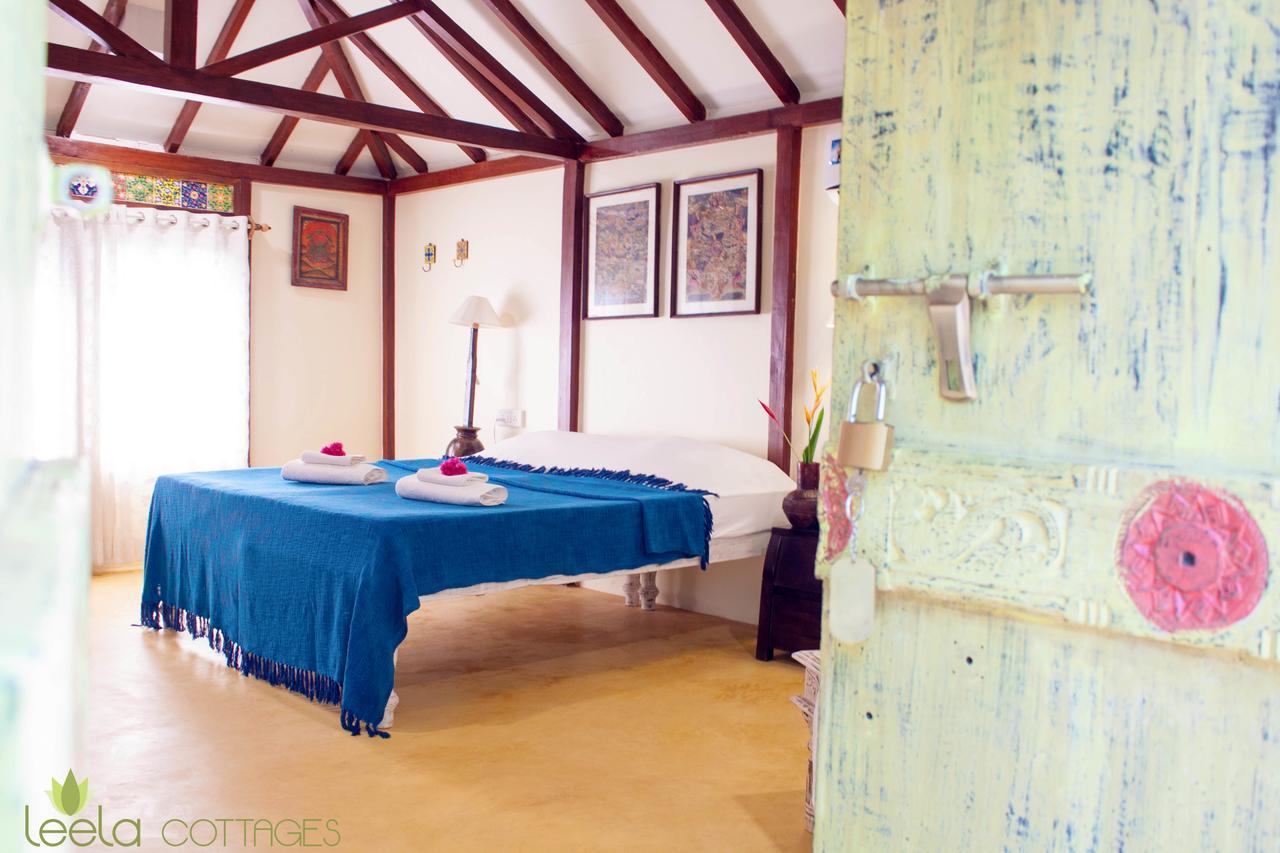 Leela Cottages Morjim Bagian luar foto