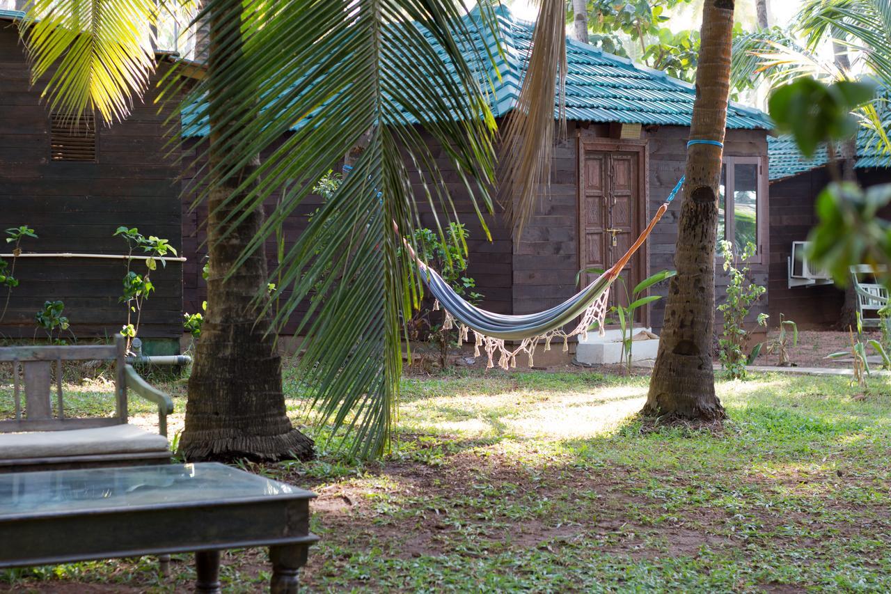 Leela Cottages Morjim Bagian luar foto