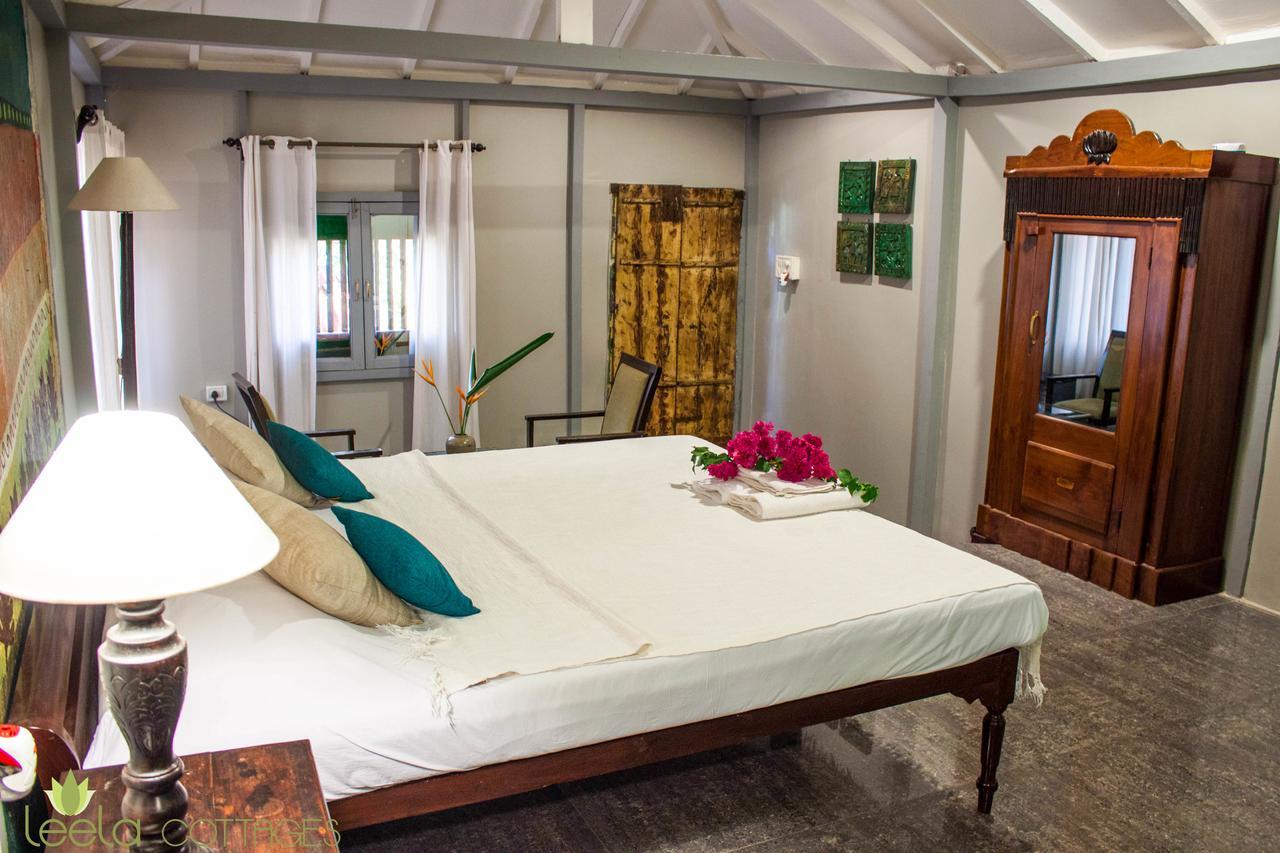 Leela Cottages Morjim Bagian luar foto