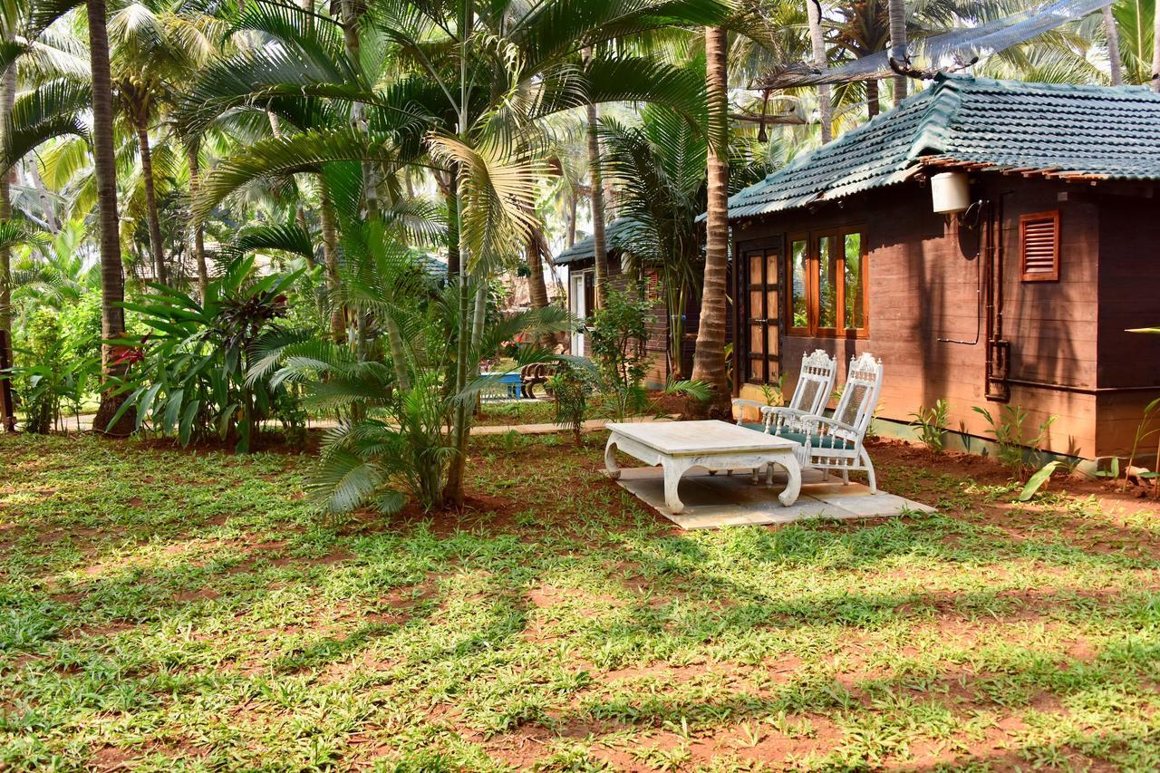 Leela Cottages Morjim Bagian luar foto