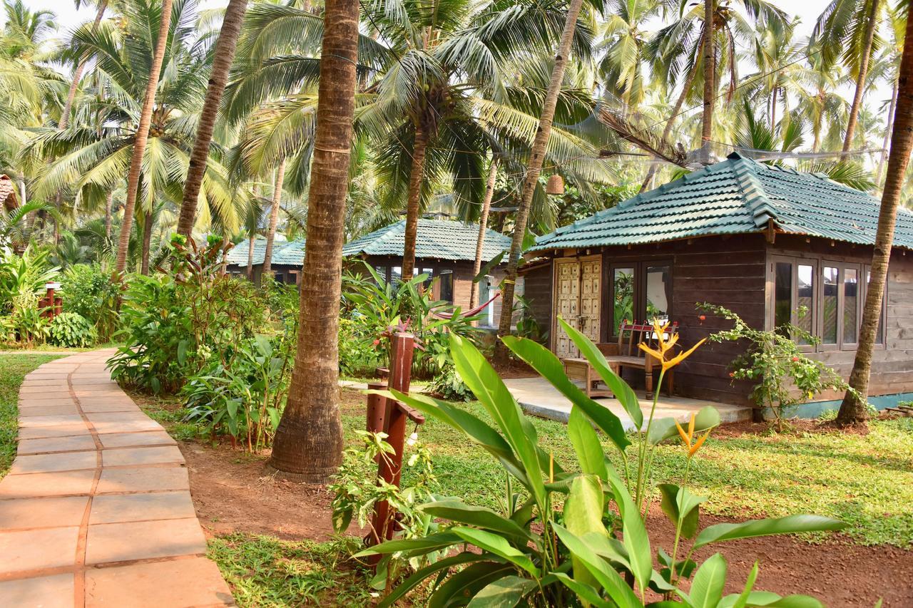 Leela Cottages Morjim Bagian luar foto