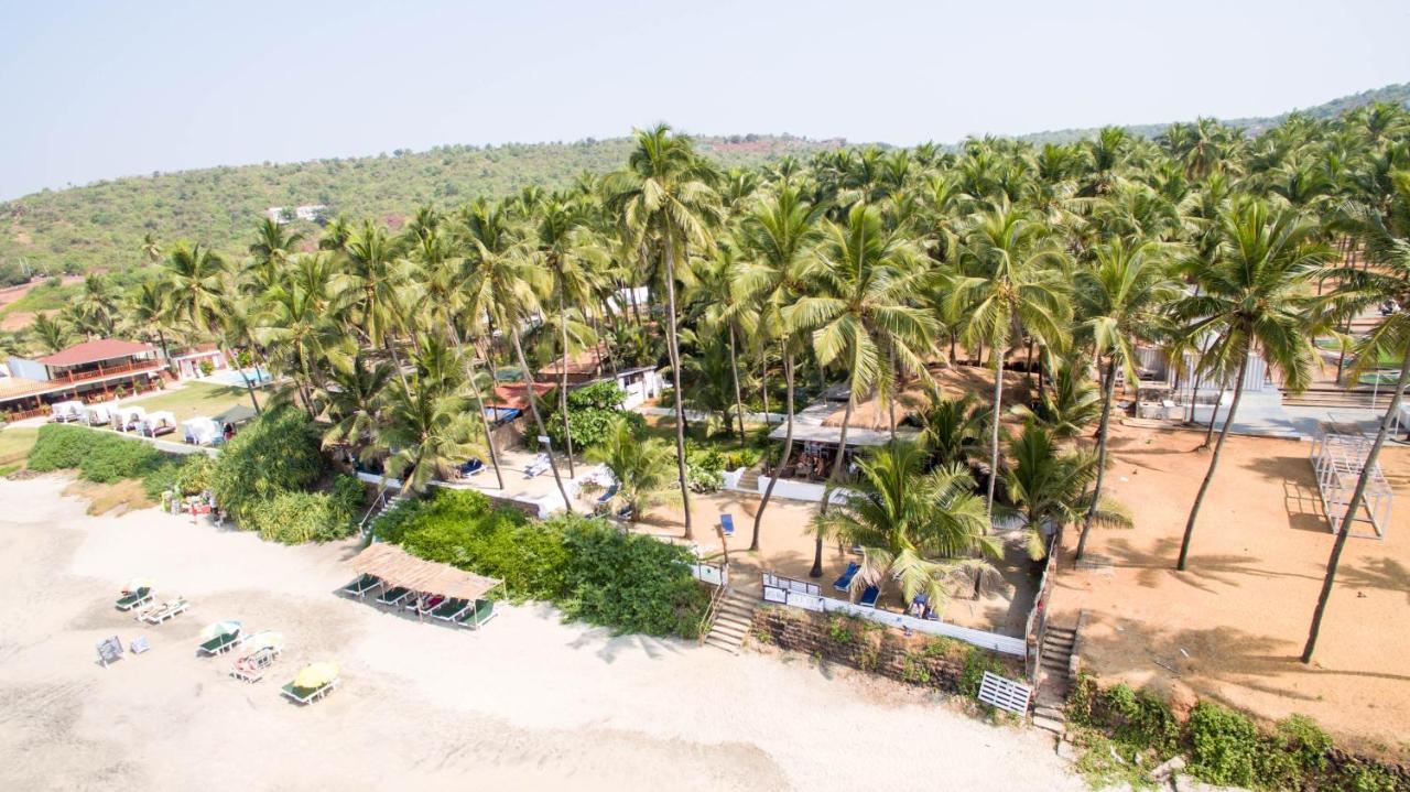 Leela Cottages Morjim Bagian luar foto
