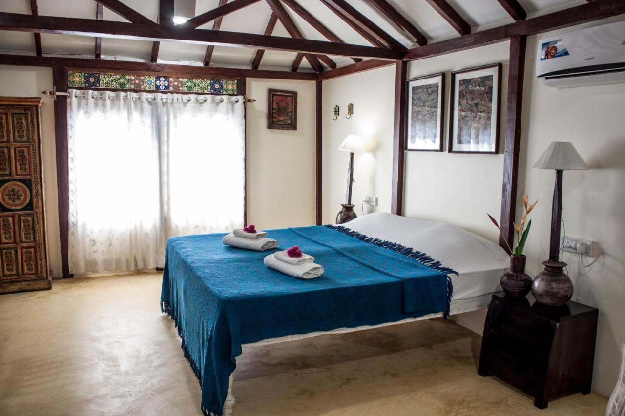 Leela Cottages Morjim Bagian luar foto