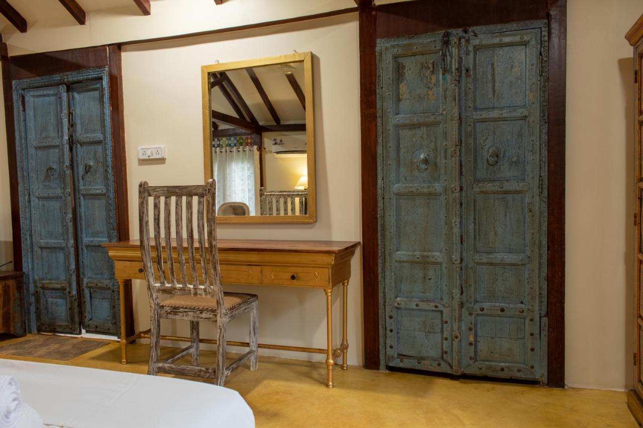 Leela Cottages Morjim Bagian luar foto