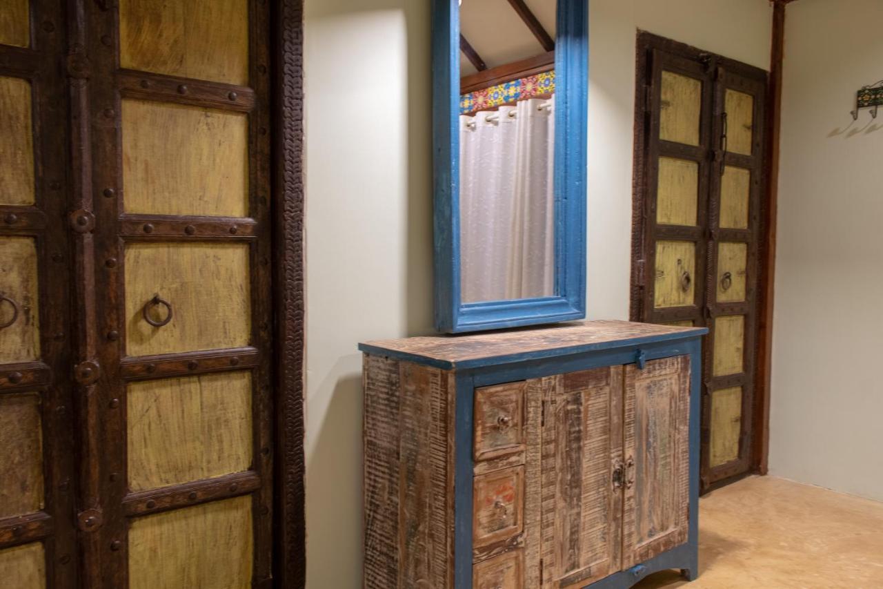 Leela Cottages Morjim Bagian luar foto