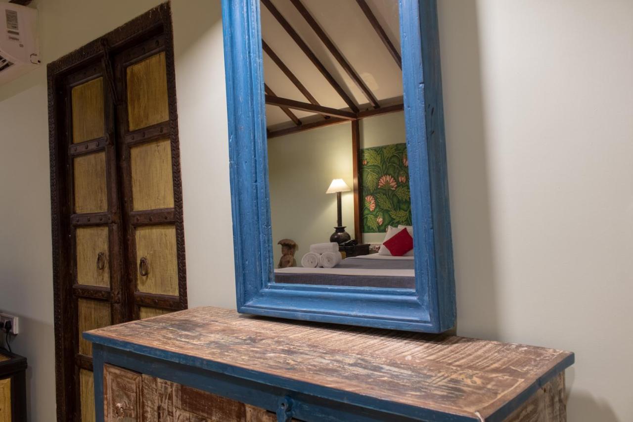 Leela Cottages Morjim Bagian luar foto